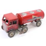 A Mettoy tin plate and clockwork model of an International Oil tractor unit and petrol tanker,