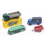 A collection of French Dinky Toys models to include a boxed No. 33B Simca Cargo Tipper Truck,