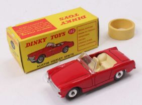 Dinky Toys No. 112 Austin Healey Sprite saloon comprising red body with cream interior and spun hubs
