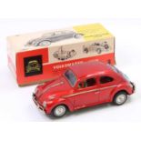 A Bandai of Japan No. 960 tin plate and battery operated model of a Volkswagen Sedan finished in