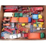 A collection of mainly Dinky Toys in play-worn condition including No. 903 Foden Flat Truck, No. 418