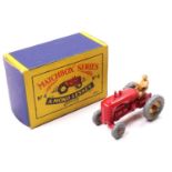 Matchbox Lesney No. 4b Massey Harris Tractor in red with a tan driver figure - a second issue