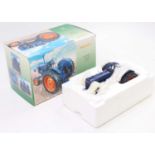 A Universal Hobbies 1/16 scale No. UH2638U Fordson Major E27N tractor comprising blue body with