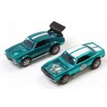 2 Mattel Hot Wheels "Redlines" issues comprising a Mighty Maverick in aqua with a black interior and