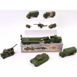 A collection of Dinky Toys military vehicles including a boxed No. 660 Tank Transporter, No. 651