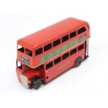 Triang Minic No.60M tinplate and clockwork double decker bus, comprising red and white example