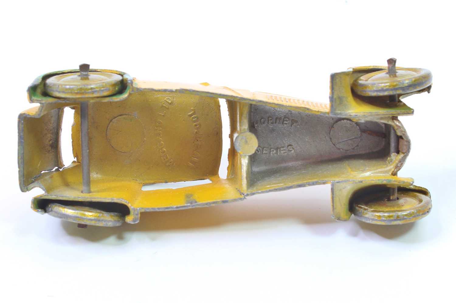 A Dinky Toys pre-war No. 22B closed sports coupe comprising yellow and green body with gold washed - Bild 5 aus 5