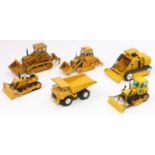 Six various loose construction-related diecast vehicles by Shinsei, NZG, and others, examples to
