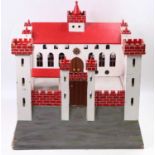 A wooden home made model of a child's Fort, handpainted in red & white with grey base, dimensions