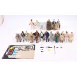 A collection of Kenner Star Wars action figures with weapons and some accessories including C-3PO,