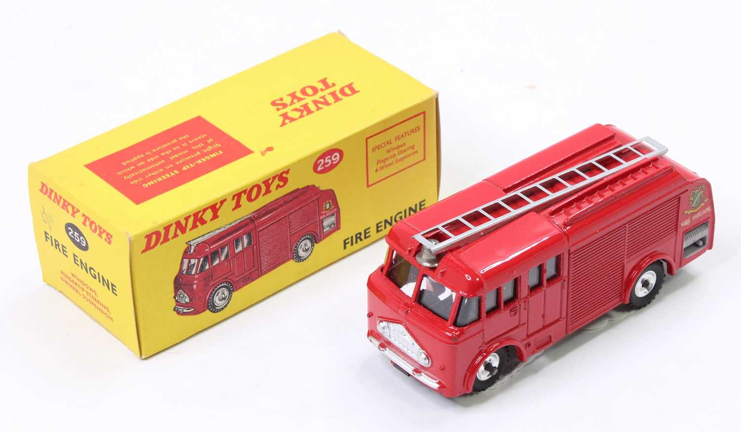 Dinky Toys No. 259 fire engine, with red body and silver detailing, spun hubs in the original