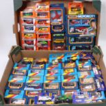 Two trays containing a quantity of various Matchbox and Corgi window boxed diecast vehicles to