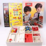 A 1960s Lego No. 810 Town Plan gift set, comprising of large card divided box with fold-out playmat,