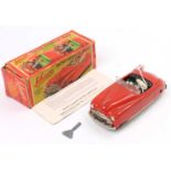 Schuco (Germany) No.4002 Tacho-Examico tinplate clockwork Car, red body with dark green seats,