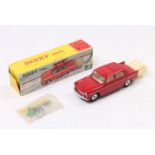 A French Dinky Toys No. 536 Peugeot 404 with trailer, comprising of red body with cream interior and