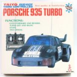 Taiyo Toys Japan boxed battery-powered radio controlled Porsche 935 Turbo together with a Hong