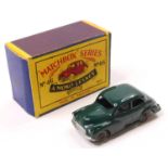 Matchbox Lesney No. 46 Morris Minor 1000 with a green body, metal wheels and silver trim in its