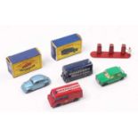 A small collection of Matchbox Lesney models comprising No. 25 Volkswagen Beetle with a steel blue