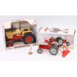 An Ertl mixed scale agricultural diecast group, two pieces to include an Ertl large scale model of a