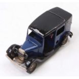 Triang Minic 35M Post-war Taxi Cab, dark blue and black body with black tyres, housed in the