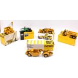 Five various boxed Caterpillar and Moxy related construction vehicle diecast group to include an NZG