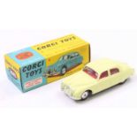 Corgi Toys No. 208S Jaguar 2.4Litre saloon comprising of a lemon yellow body with red interior and