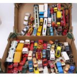 Two trays containing a large quantity of Corgi Toys vehicles in play worn condition to include,