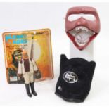 A Palitoy Bradgate Planet of the Apes Dr Zaius figure with its original card, together with a