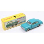 French Dinky No.542 Ford Taunus 12M, comprising turquoise body with cream interior, spun hubs in the