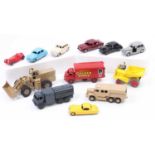 A collection of 12 repainted Dinky Toys models including No. 689 Medium Artillery Tractor, No. 923