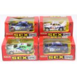 An SCX Matchbox slot car racing vehicle group, four boxed examples to include a No. 83950 Subaru