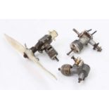 A collection of radio control and nitro powered aircraft engines, three loose examples to include