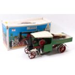 A Mamod SW1 steam wagon comprising of white and green body, with burner, fuel tablets, steering rod,