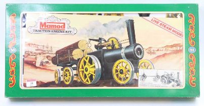 A Mamod boxed traction engine kit housed in the original green ground window display packaging