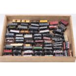 A large tray containing a collection of various loose Hornby Bachmann and similar 00 gauge rolling