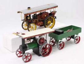 A Mamod steam traction engine with canopy complete with burner and scuttle, and accompanying trailer