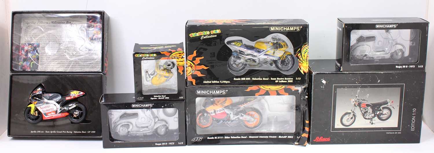 A collection of boxed Minichamps 1/12th scale motorcycles to include 3 Valentino Rossi examples -
