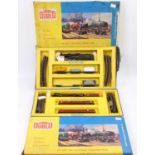 Two Hornby-Dublo 2-rail train sets: No. 2025 2-8-0 Heavy Freight comprising BR black loco 48109,