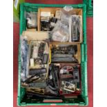 Large tray containing 00 gauge items from a modeller’s workshop – loco bodies, chassis, motors,