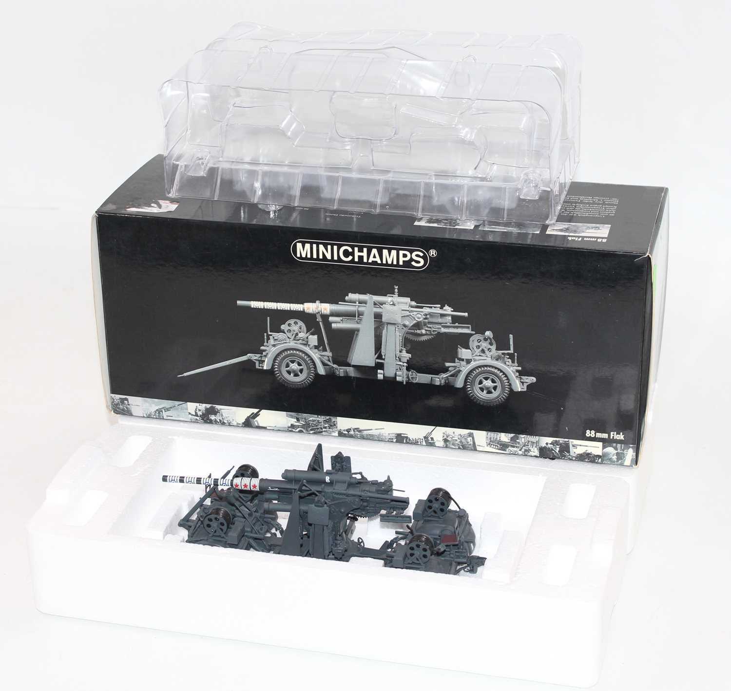 Minichamps Model No. 011080 1/35 scale model of an 88mm flak cannon on a trailer, appears as