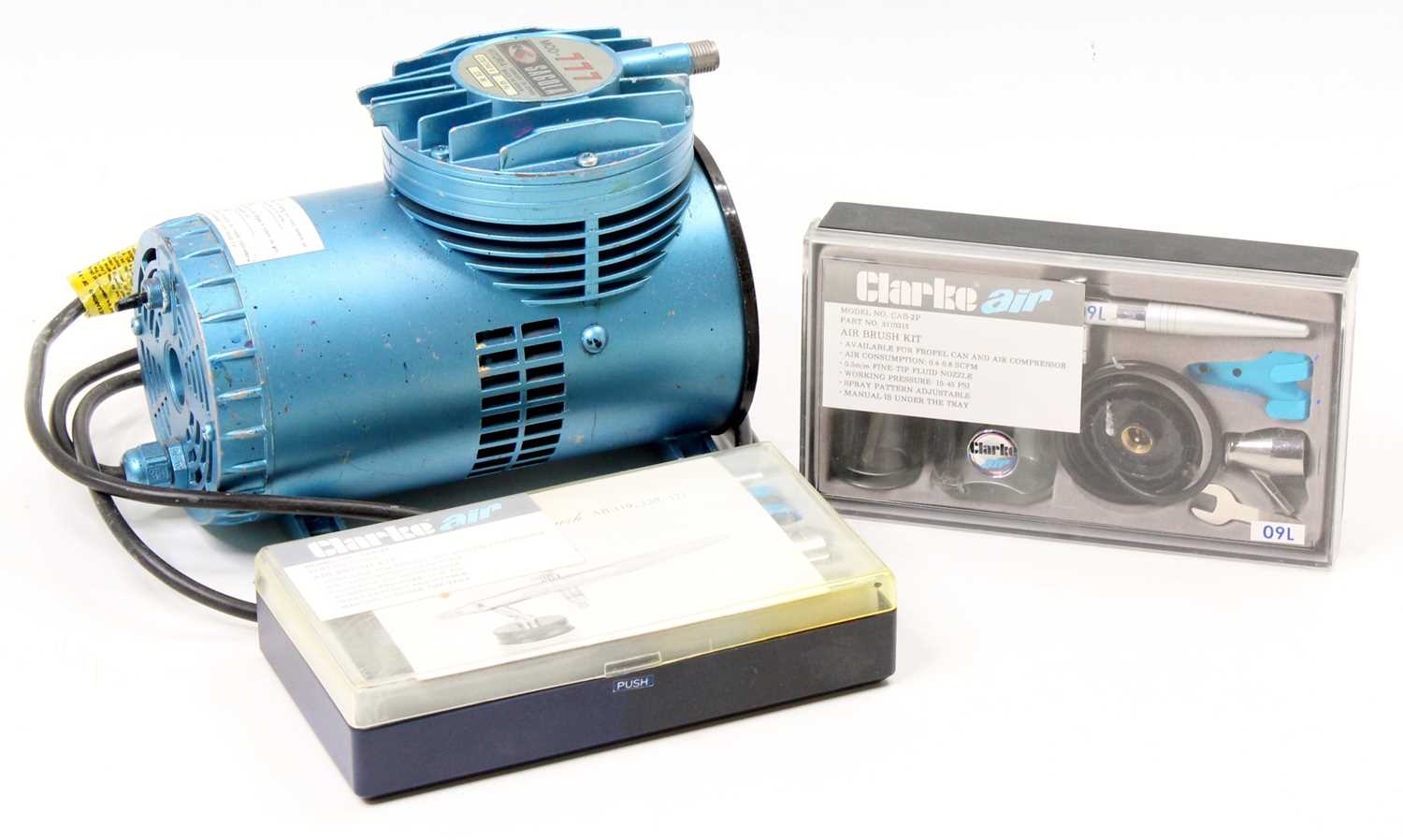 A Sagola 220/240v air compressor, complete with two boxed Clark Air airbrush sets, untested