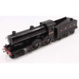 A totally repainted clockwork 4-4-0 loco & tender unlined gloss black. Believed originally Bassett-