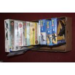 A box of plastic kits to include Revell, Airfix Mayflower, Royal Air Force Airfix kit etc