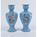 A pair of 20th century pottery vases, each decorated with birds amongst flowers, h.27cm