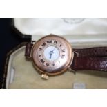 A lady's vintage 9ct gold cased half hunter wristwatch, having manual wind movement, dia.26mm, on