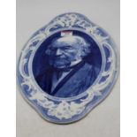 A Burgess & Leigh William Gladstone Flow blue and white glazed commemorative porcelain wall