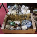 Two boxes of miscellaneous items to include two pairs of turned brass candlesticks, figural