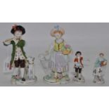 Four Sitzendorf hard paste porcelain figures, each shown in 18th century dress, the largest h.17cm