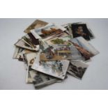 A box of mainly Edwardian vintage postcards, to include real photographic, humerous & topographical