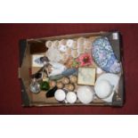 A box of ceramics, to include a Lladro porcelain model of a swan and a pair of Victorian coffee cans